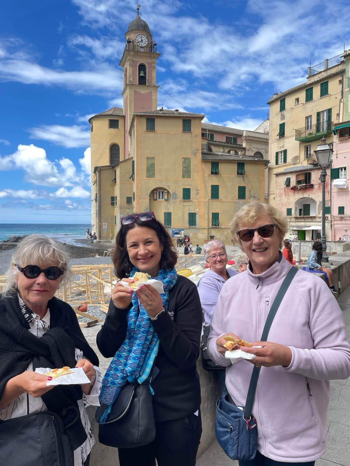 Group of friends eating in Italy