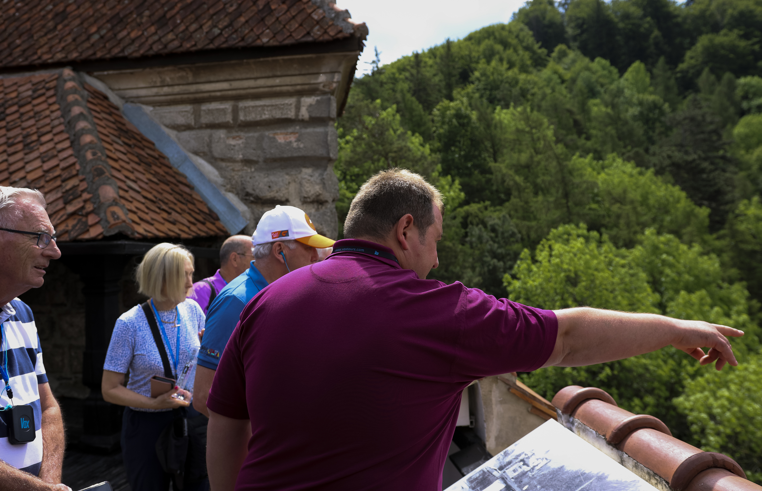 Tour Leader guiding guests around Bran Castle
