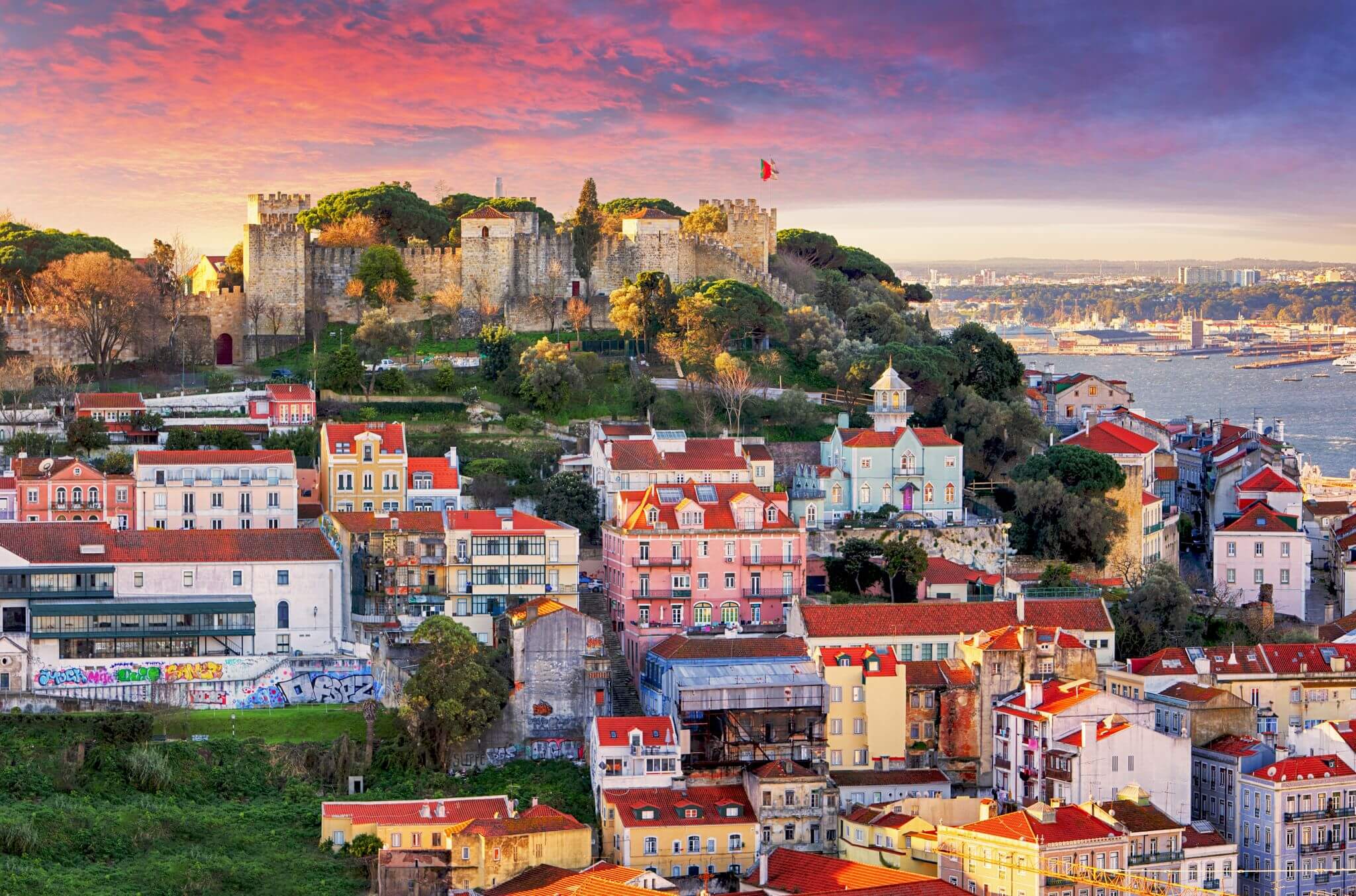 São Jorge Castle behind colourful buildings of Lisbon