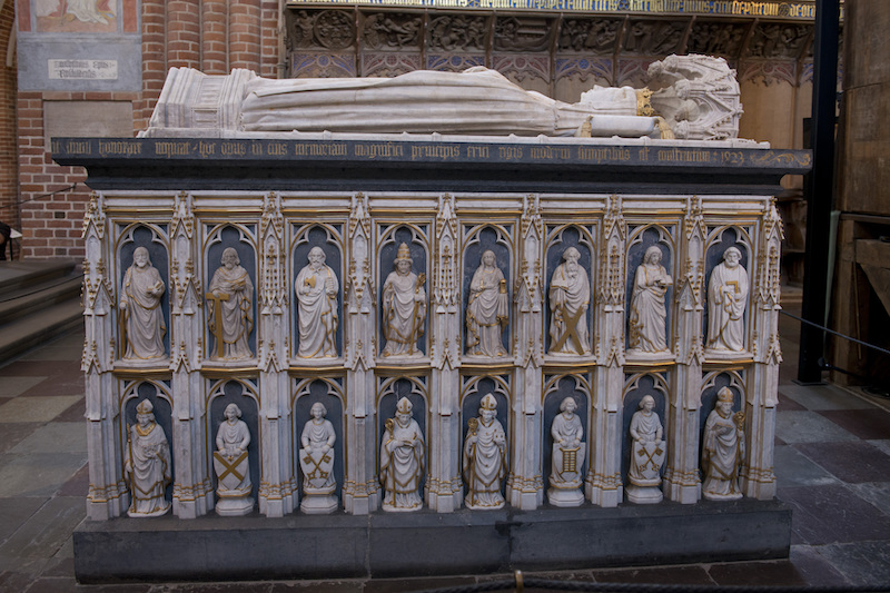 elaborately decorated tomb of a medieval king in Roskilde Cathedral, Denmark