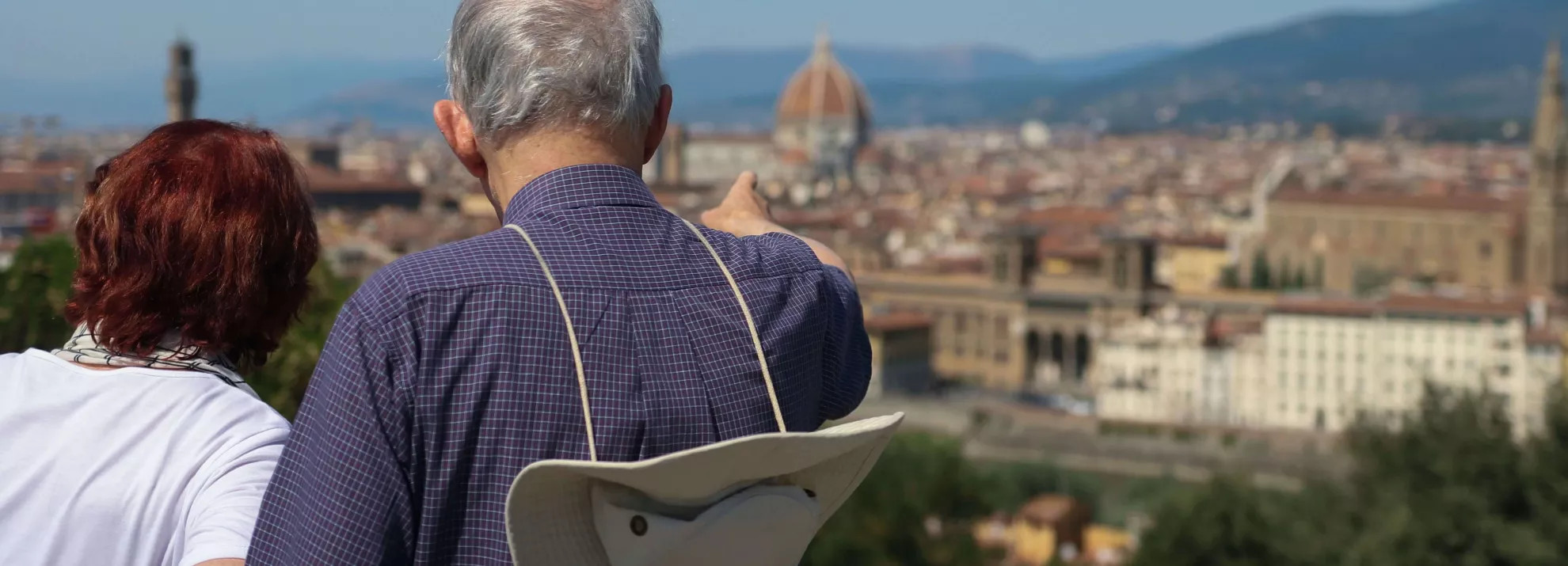 Two people enjoying the view in Italy