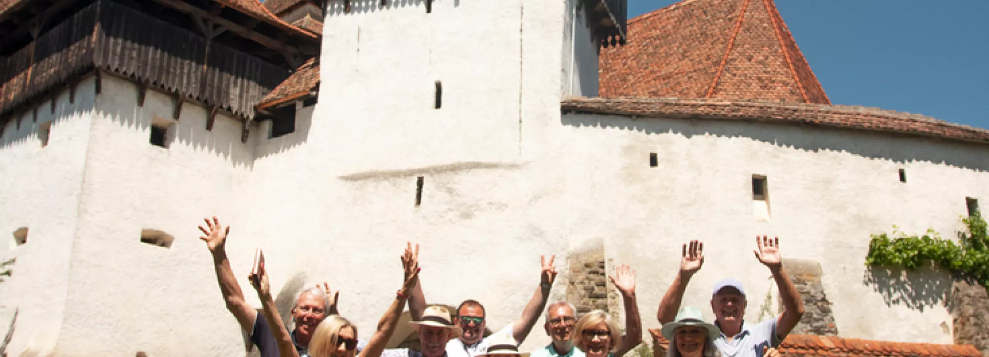A group standing outside the Viscri Fortified church