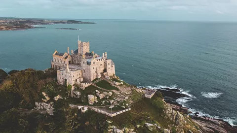 A view of St Michaels Mount, an island-bound medieval castle overlooming the coast of Cornwall.