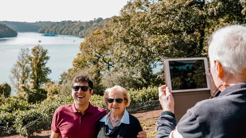 Travellers posing for a picture at the Tregothnan botanical gardens.