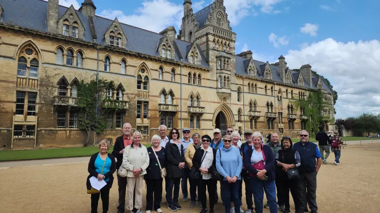 A Blue-roads tourist taking a group photo