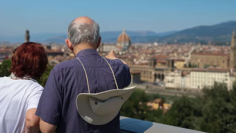 Two people enjoying the view in Italy