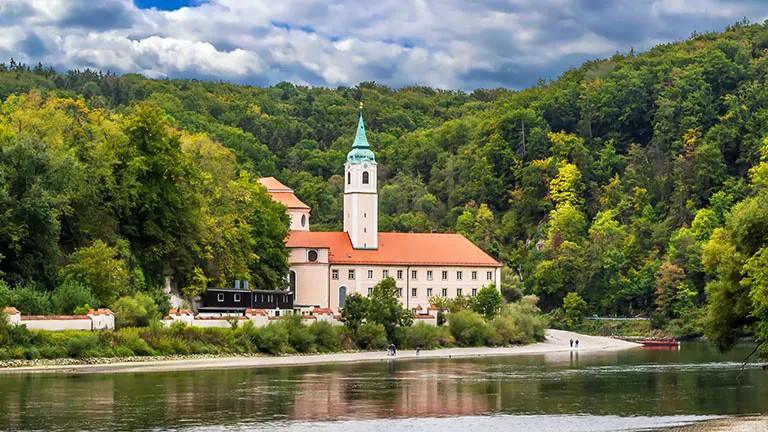 View of Weltenburg Abbey in Kelheim, Germany from across the Danube River