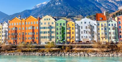 Colourful houses of the city of Innsbruck line the Austrian Coast.