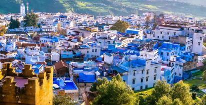An aerial view of the striking blue-washed buildings of Chefchaoeun's old town.