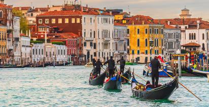 Boats on the water in a European city.