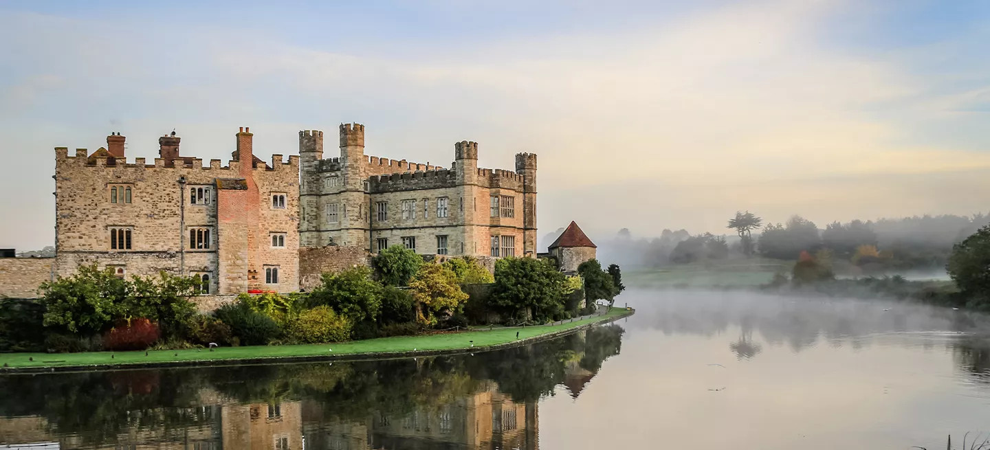 A landscape view of Leeds Castle in England.