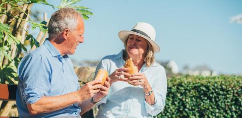 Couple together enjoying a snack