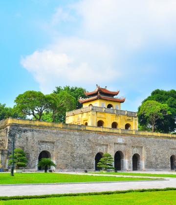 An Asian temple during a day with clear skies.