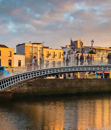 A bridge spanning the river Liffey coursing through Dublin.